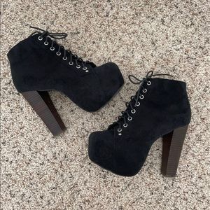 Black platform booties by Shi by Journey